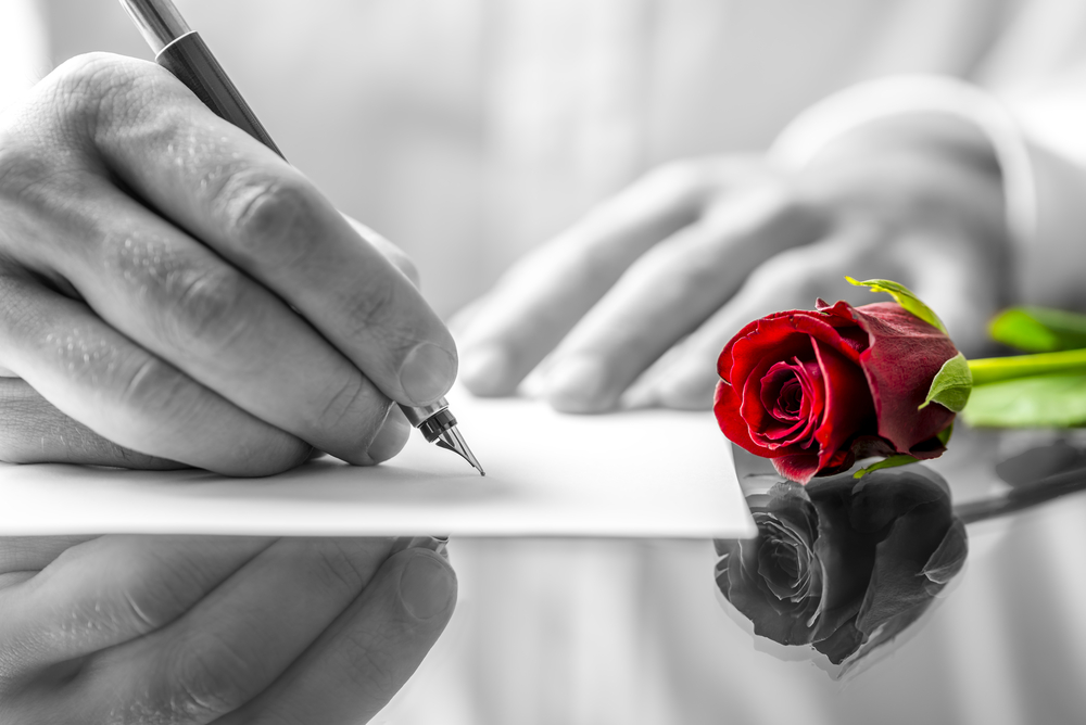 poeta che scrive frasi d'amore