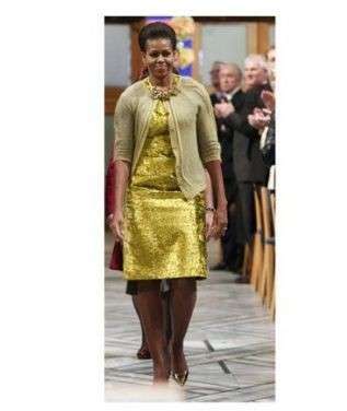 Michelle Obama di nuovo in giallo: abito Calvin Klein