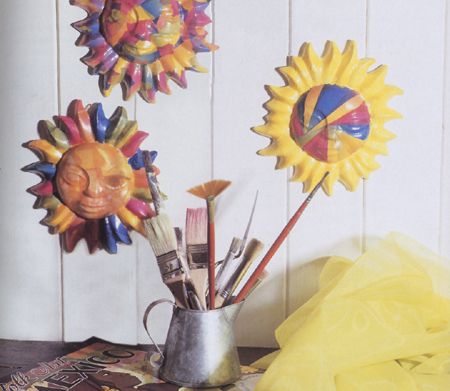 Decoupage: un sole in ceramica multicolore per ridare vita alla tua cucina
