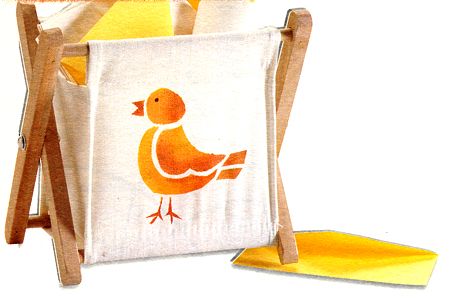 Impreziosisci un cestino portacarte con uno stencil colorato