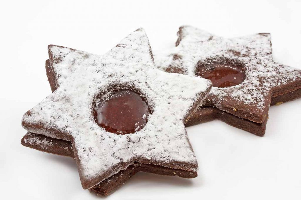 Biscotti alla Nutella a forma di stella con zucchero a velo