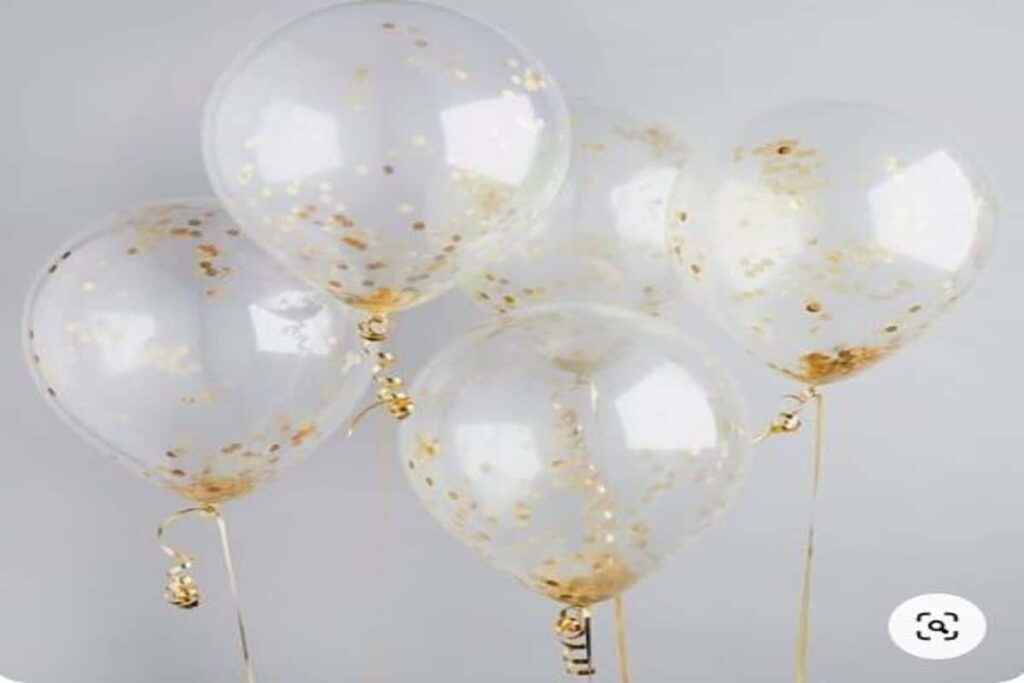 palloncini trasparenti con coriandoli dorati all'interno