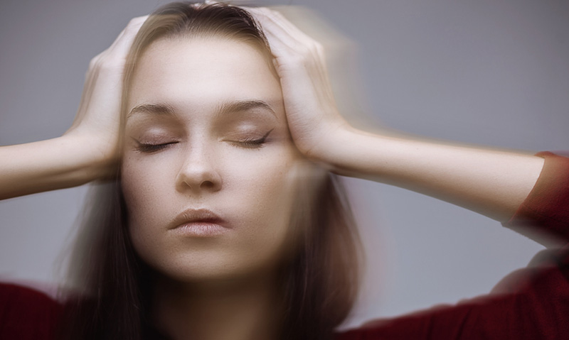 woman standing up too quickly vertigo
