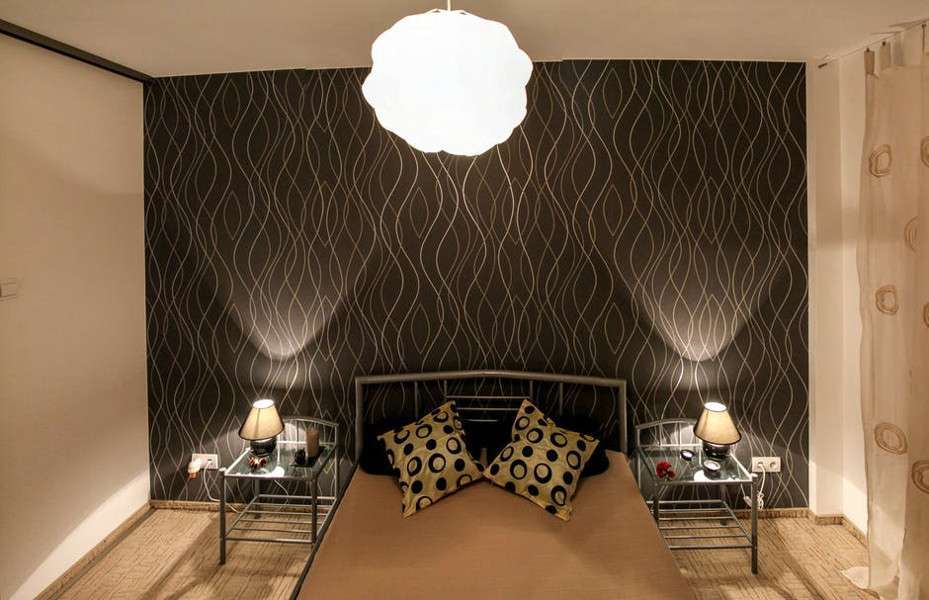 Come illuminare la camera da letto con un design moderno e originale
