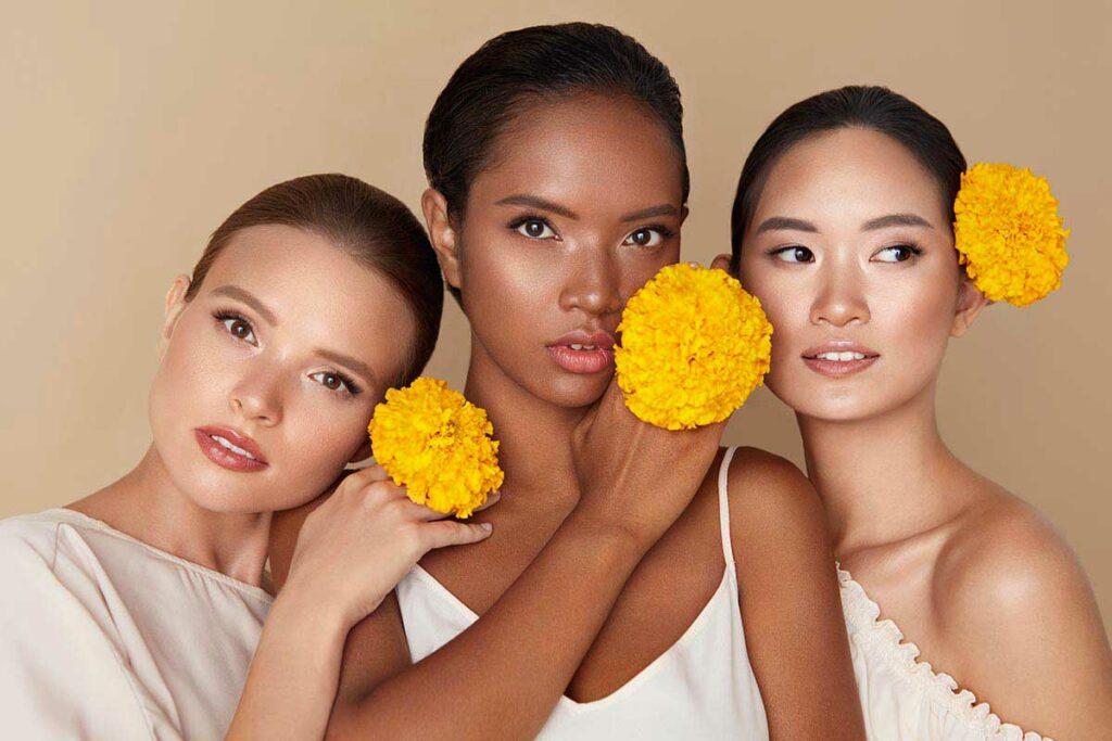ragazze di diverso colore di pelle con fiori