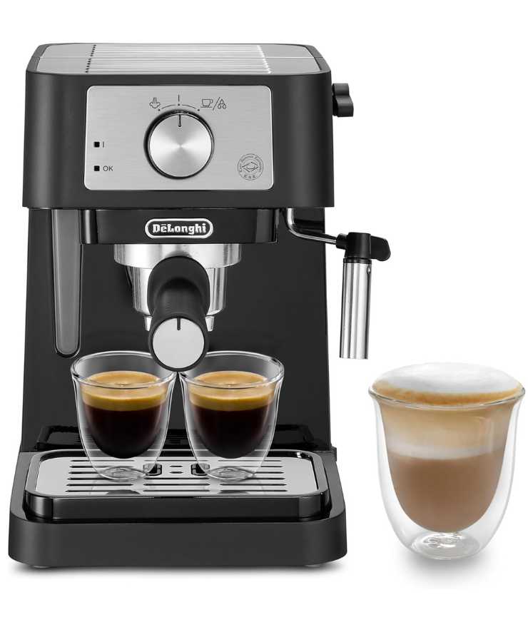 macchina da caffè nera con due tazzine di caffè e un cappuccino