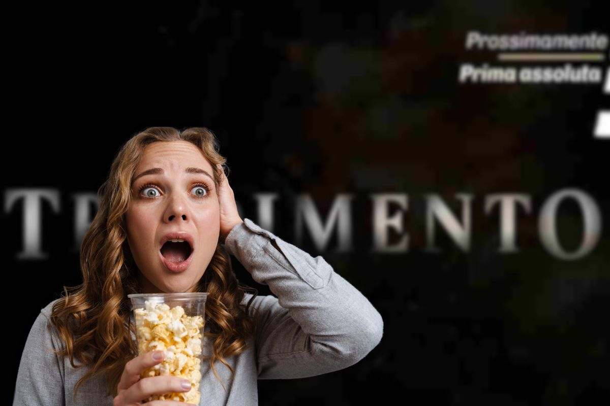 logo tradimento e donna sconvolta con pop corn in mano