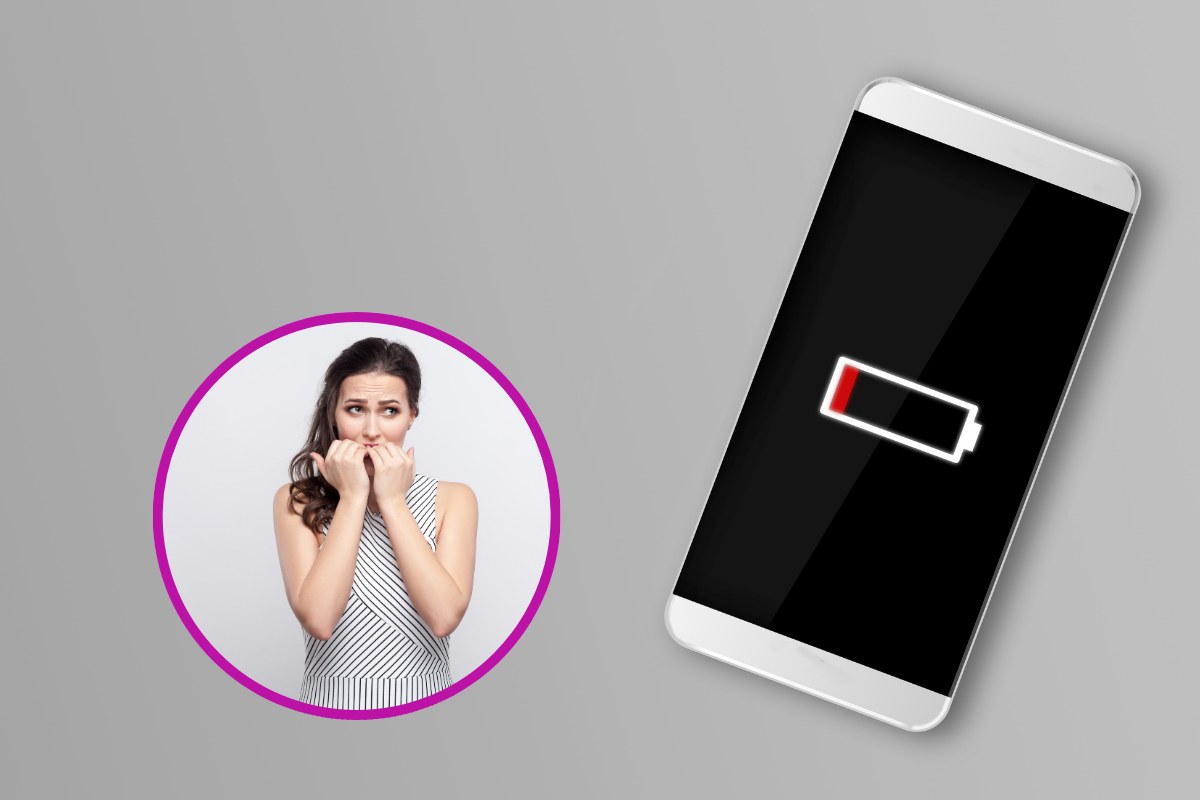 Donna preoccupata per la batteria del cellulare