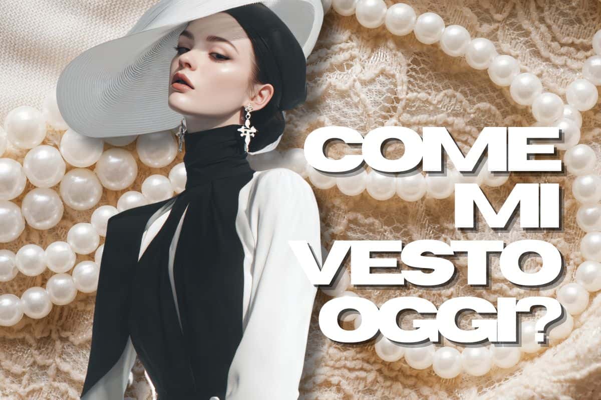 Donna con cappello bianco e perle