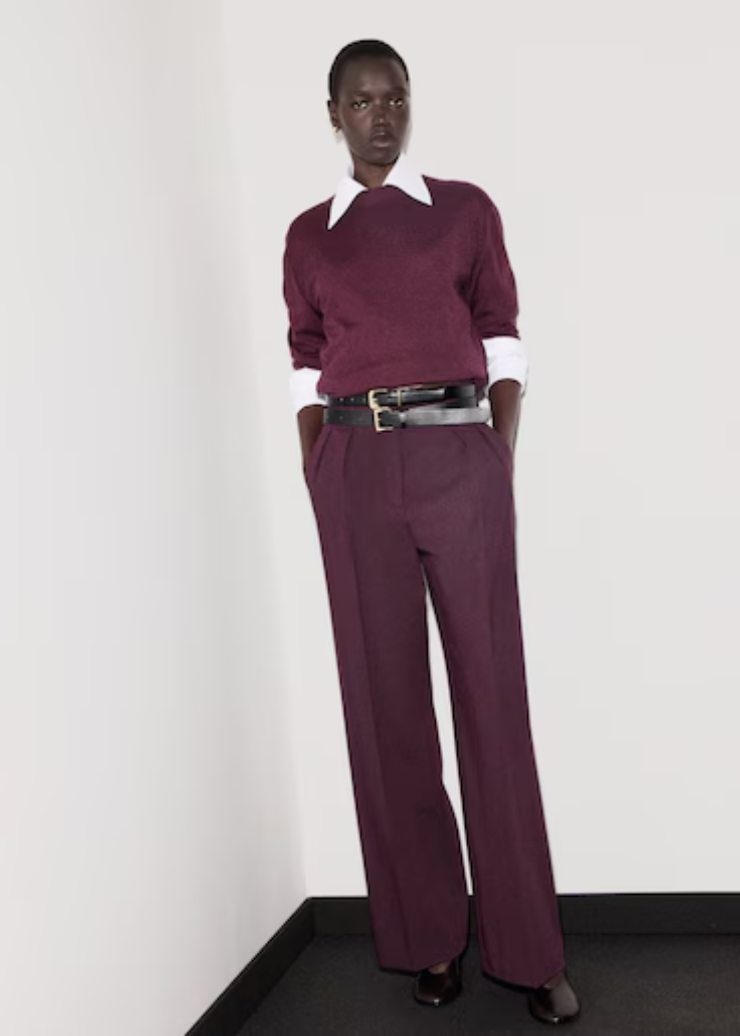 donna di colore con pullover