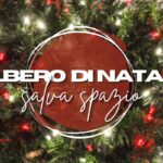 primo piano rami albero di natale con lucine