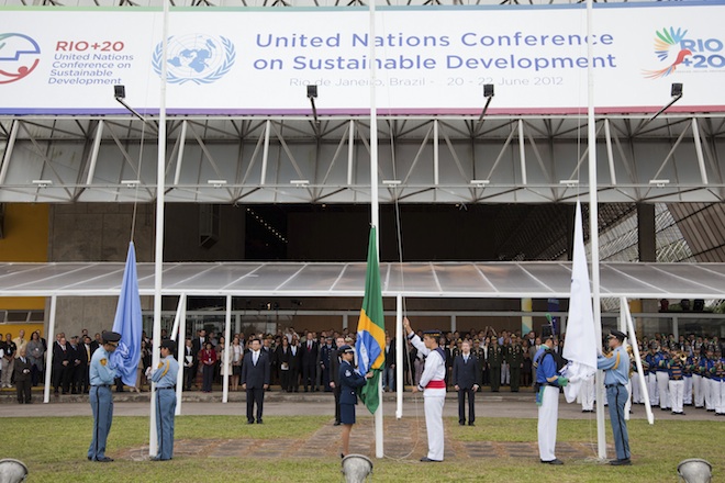 Brazilian service men raise flags during a flag hoisting ceremony in Rio de Janeiro