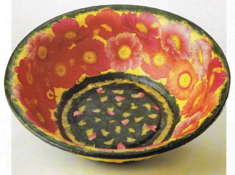 Crea un decoupage floreale su un catino di latta