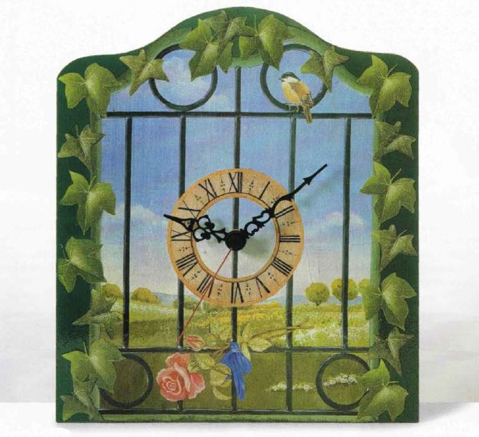Decoupage pittorico per decorare un orologio a muro