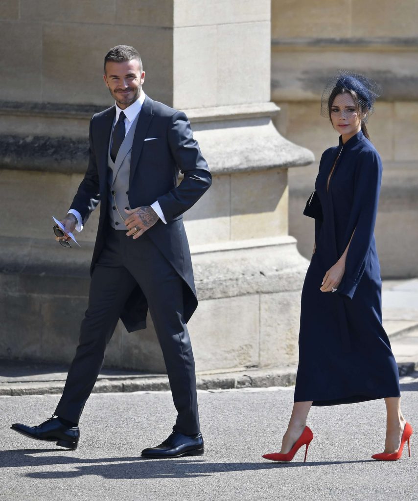 David Beckham e Victoria Beckham arrivano alla cappella di San Giorgio al Castello di Windsor prima delle nozze del principe Harry con Meghan Markle il 19 maggio 2018 a Windsor, in Inghilterra.