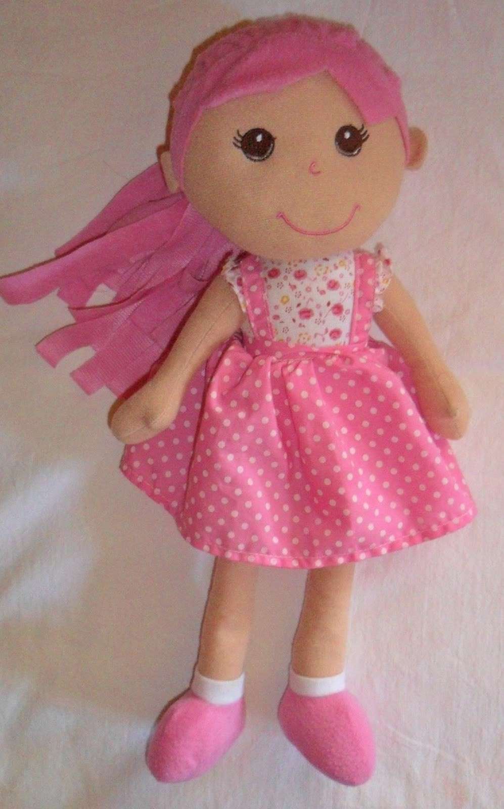 Bambola di pezza rosa