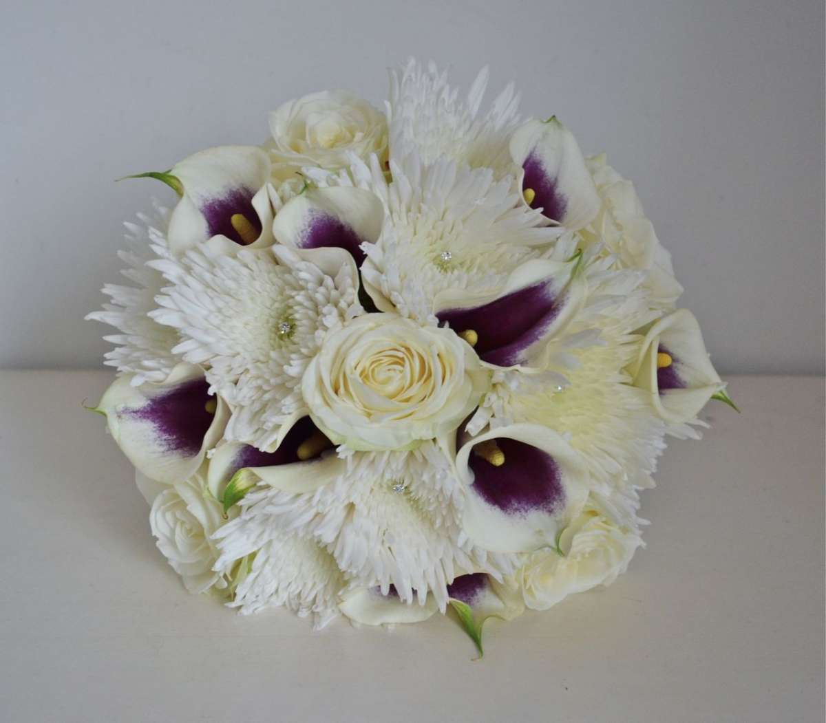 Bouquet sposa invernale bianco e viola