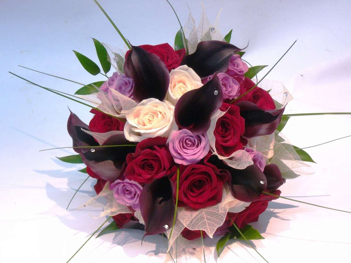 Bouquet sposa invernale rose rosse e rosa