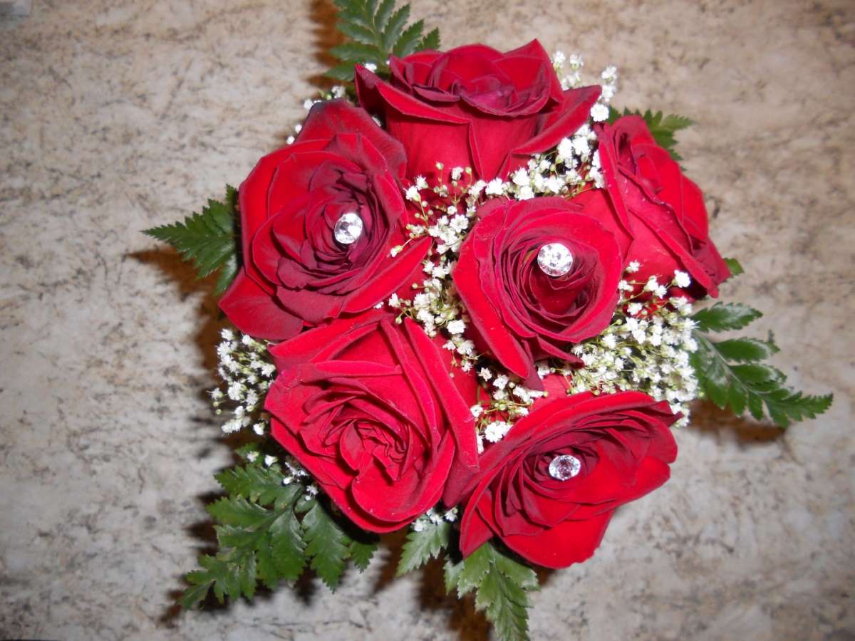 Bouquet sposa Natale con rose rosse