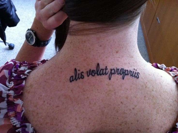 Tatuaggio donna sulla schiena