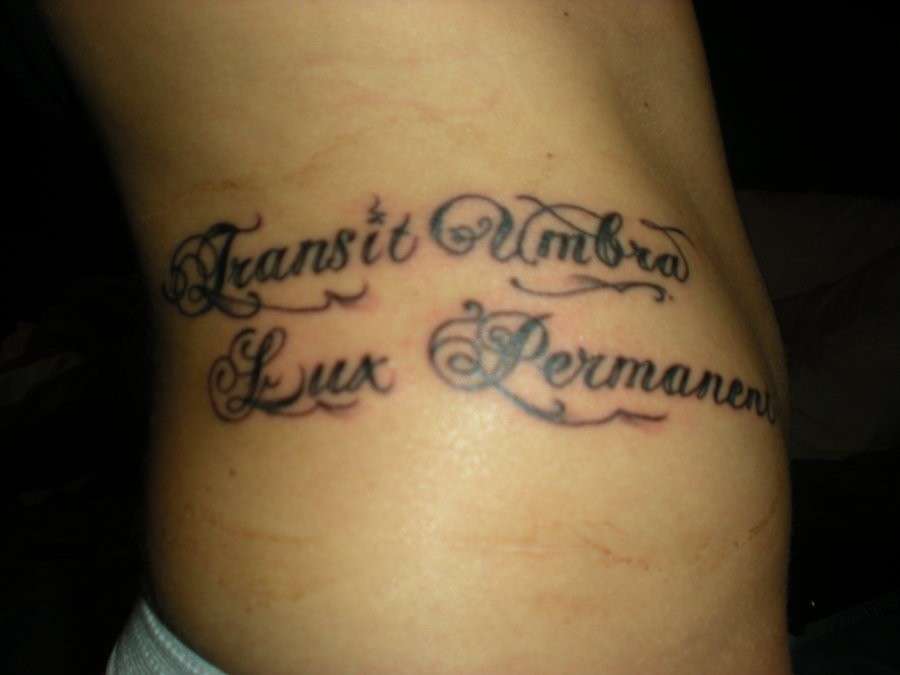 Tatuaggio Transit umbra lux permanent