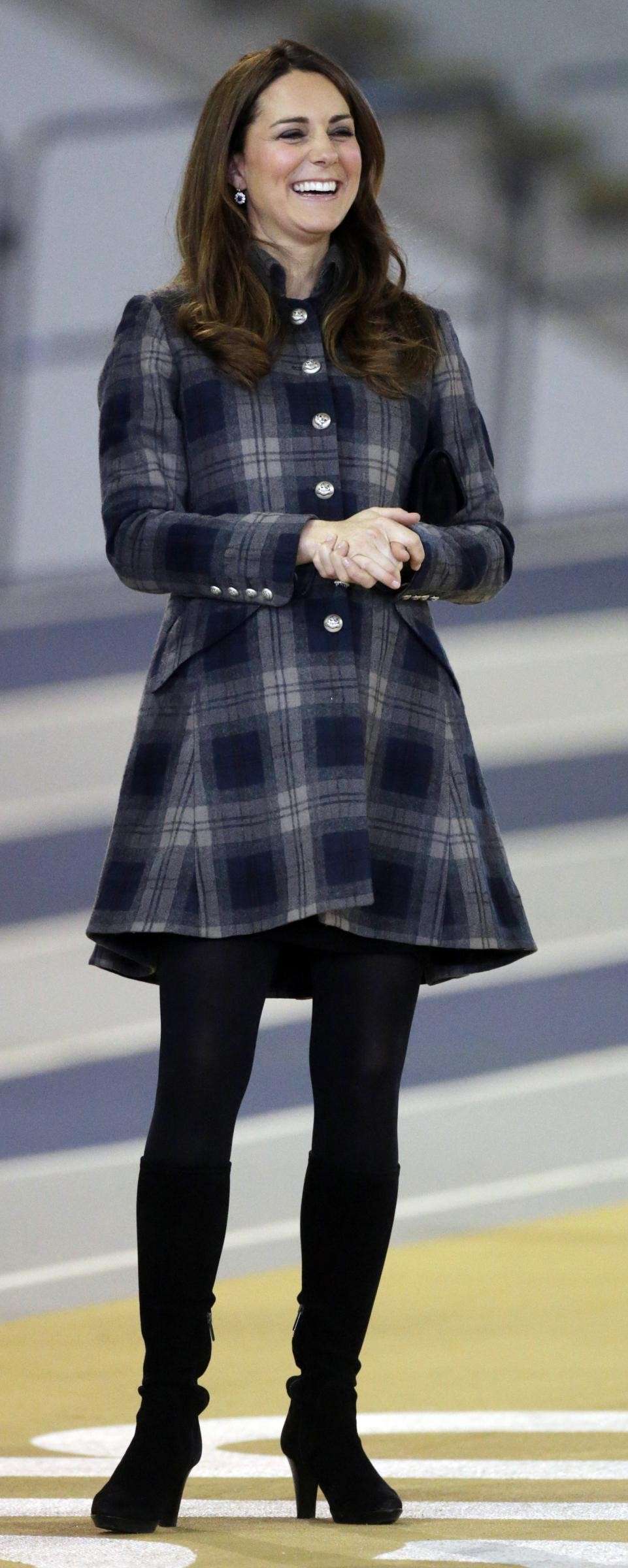 Kate con un cappotto scozzese