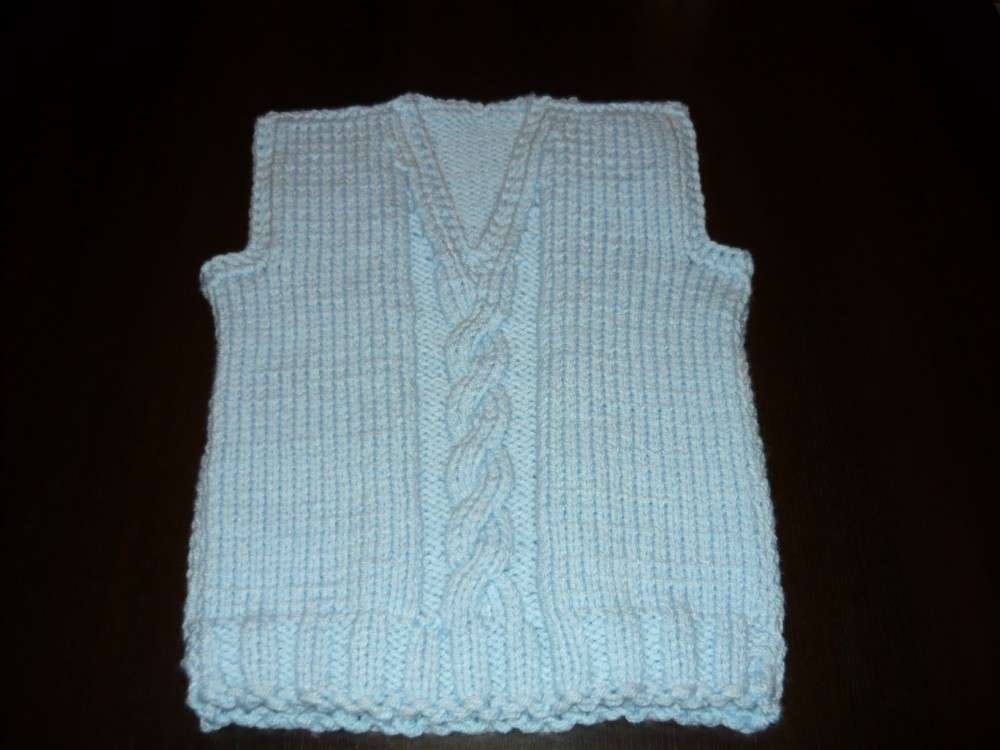 Gilet con treccia centrale