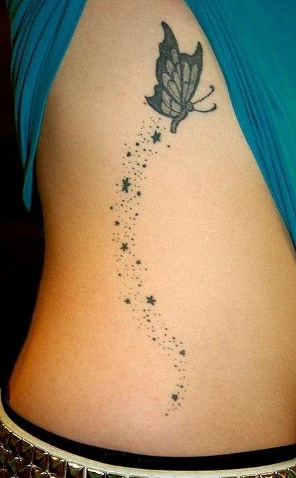 Farfalla tattoo con stelline