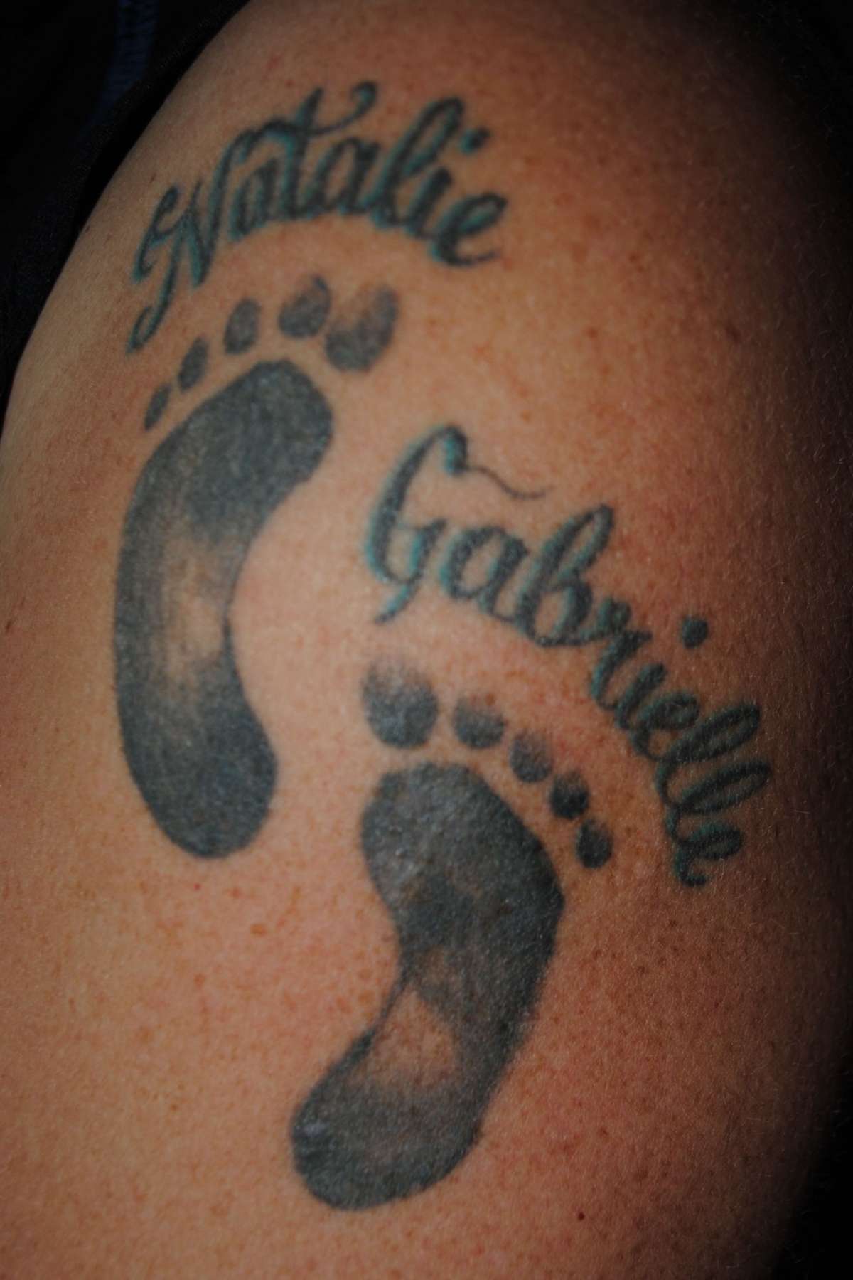 Tatuaggio con impronte