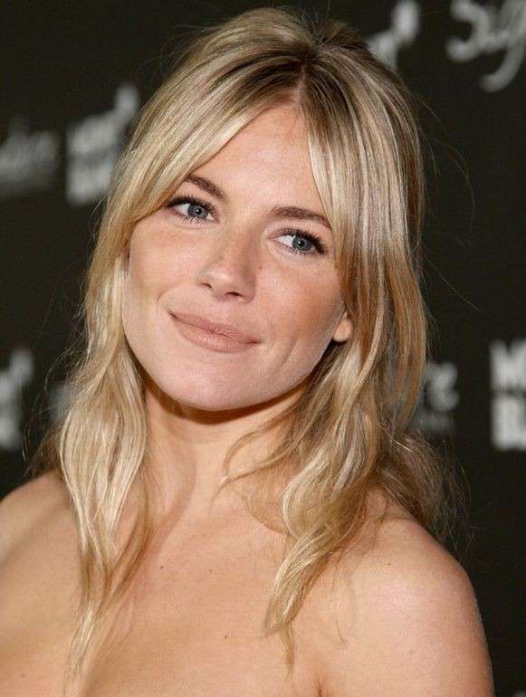 Capelli con semiraccolto di Sienna Miller