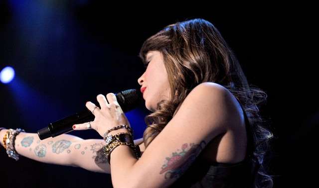 Tatuaggi colorati di Alessandra Amoroso