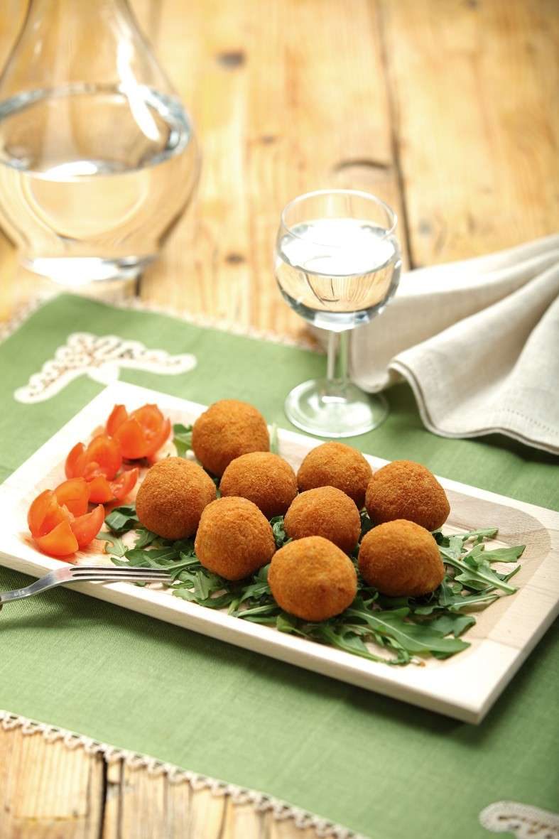 Arancini serviti come antipasto