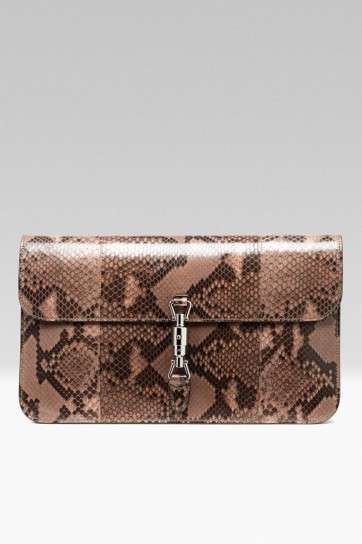 Clutch in rettile Gucci