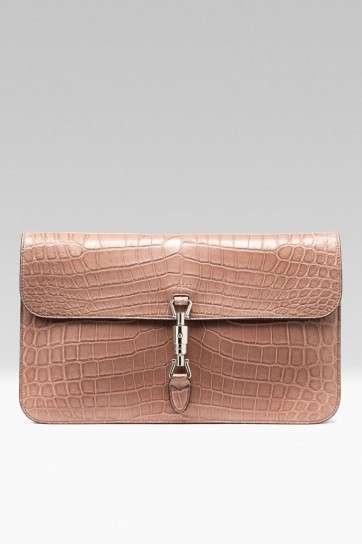 Clutch in rettile rosa Gucci