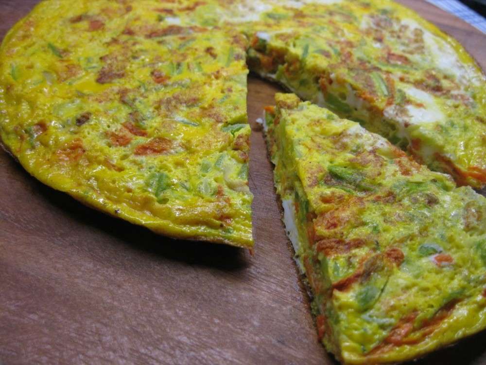 Frittata con fiori di zucca e prosciutto