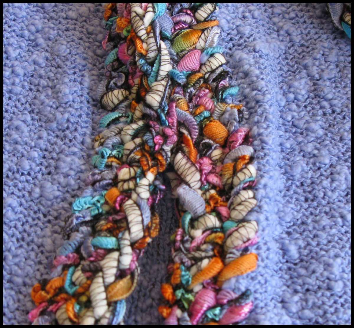 Sciarpa con maglioni colorati