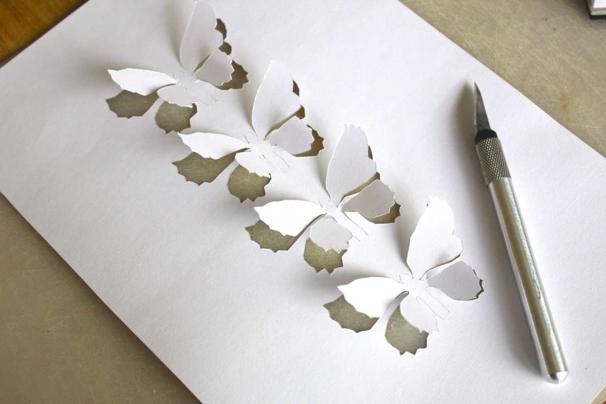 Farfalle su foglio di carta