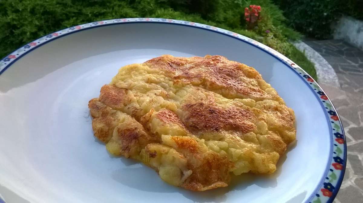 Frico con patate e cipolle ricetta