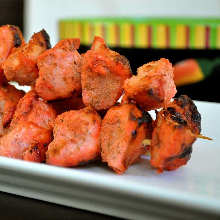 Pollo tandoori con spiedini