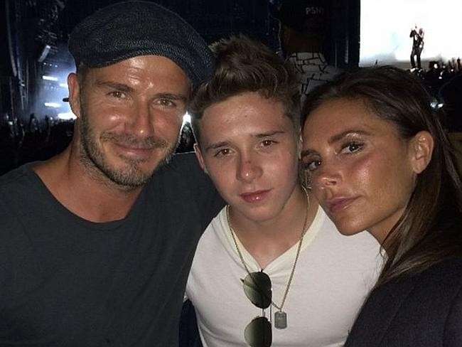 David e Victoria Beckham con il figlio Brooklyn