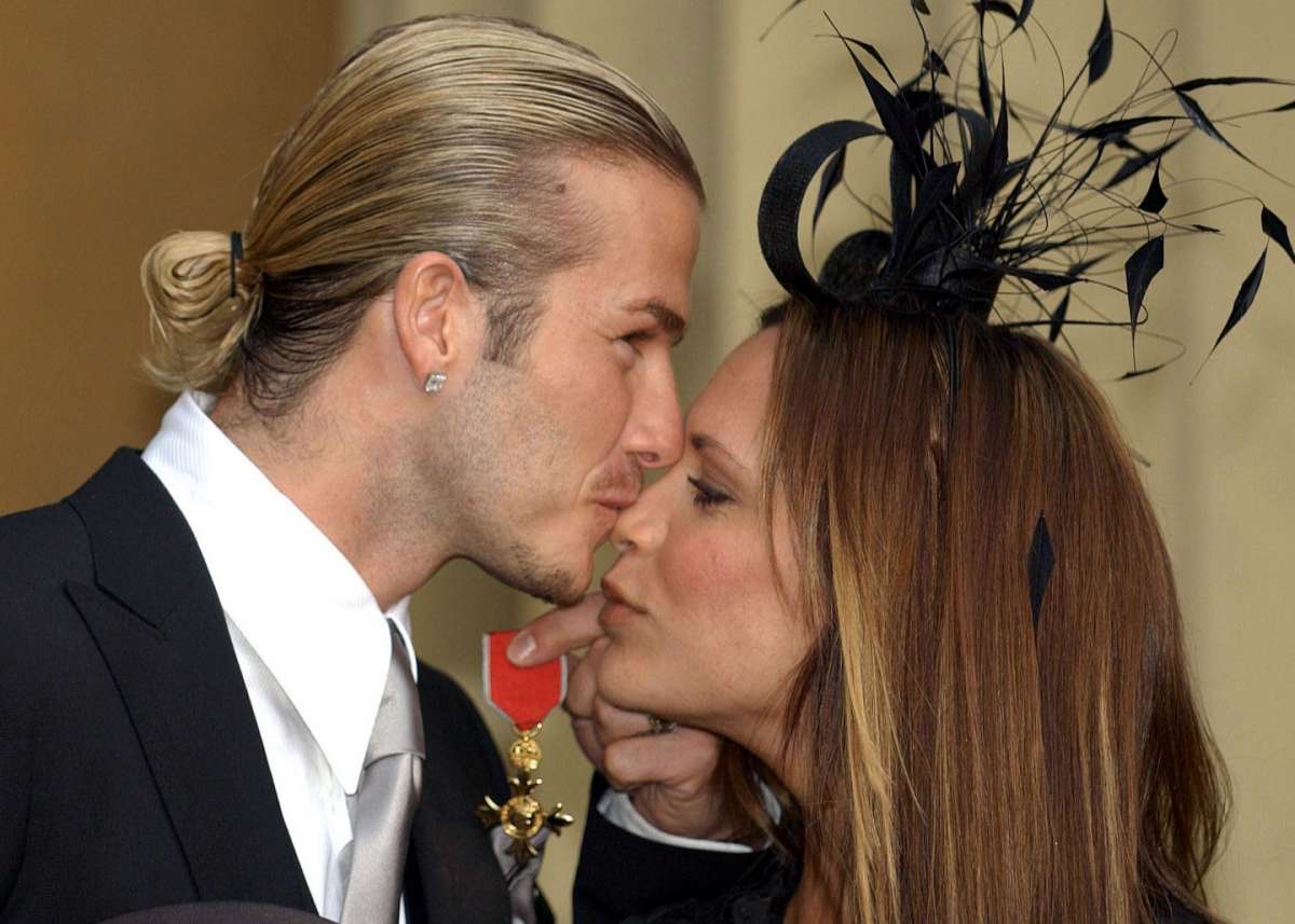 L'ex calciatore e la moglie a Buckingham Palace