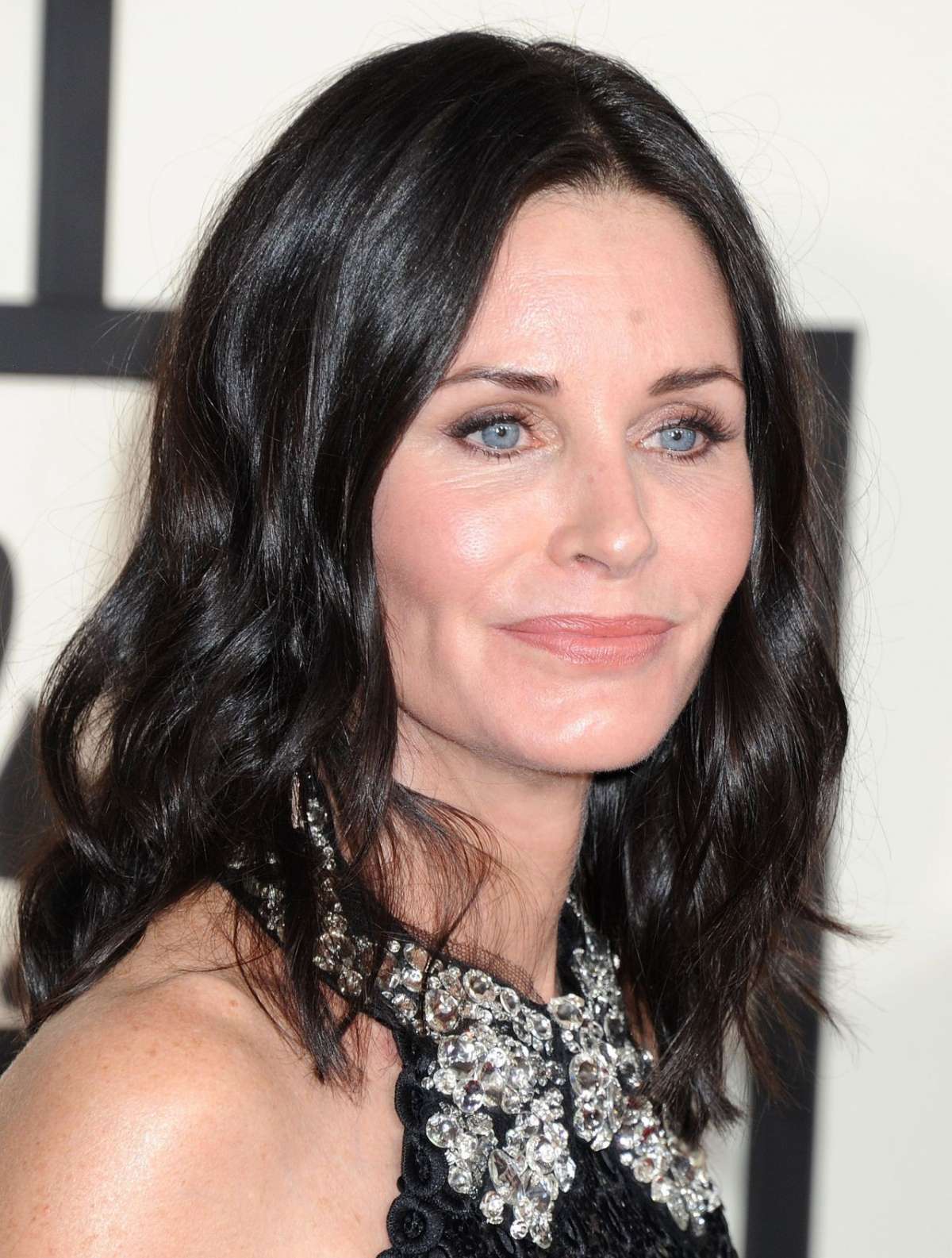 I capelli lunghi di Courteney Cox