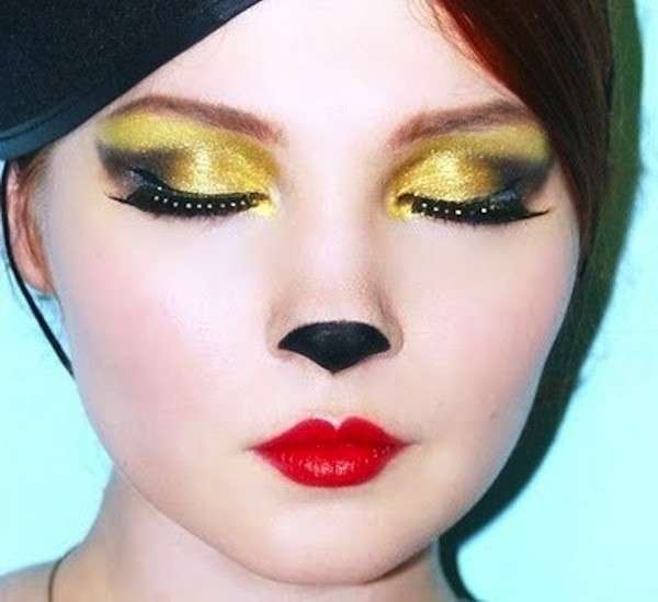 Trucco da gatta con occhi dorati