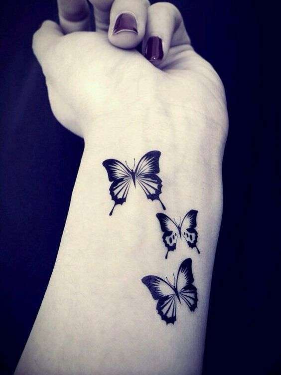 Tatuaggio farfalle bianche e nere