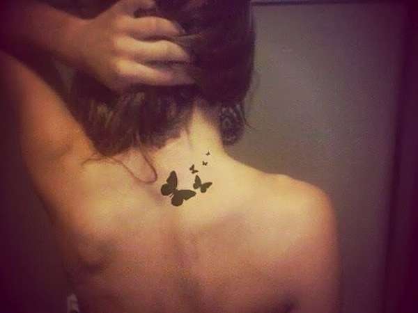 Tatuaggio farfalle stilizzate nere