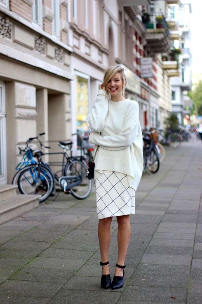 Look elegante con maglione bianco