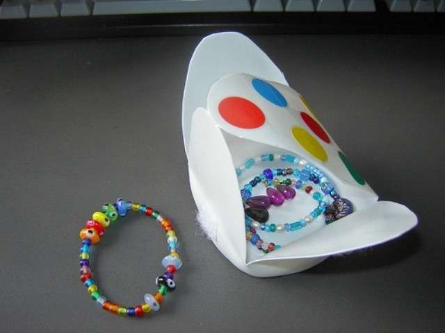 Portagioie con flacone di plastica