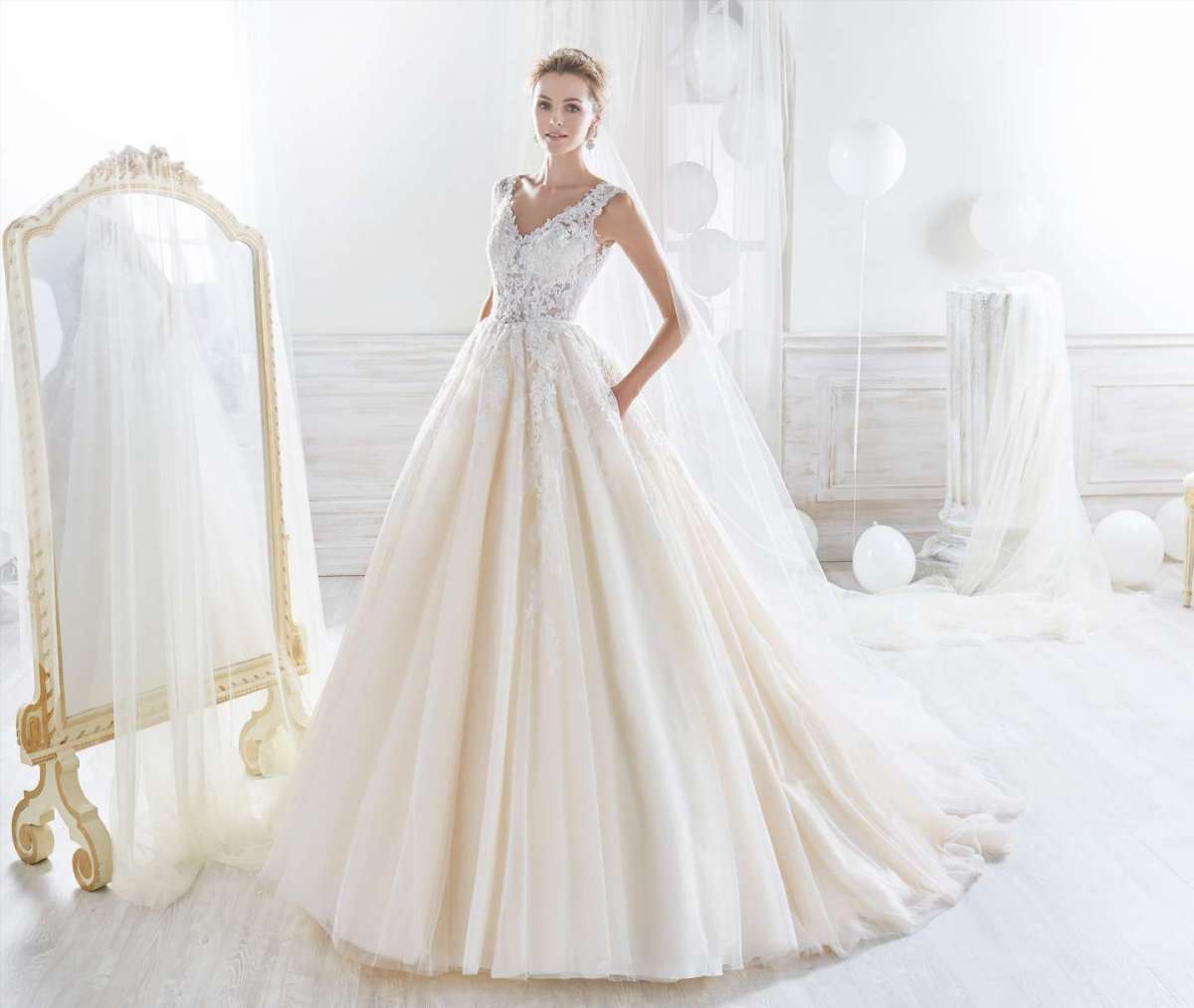 Abito da sposa in pizzo Nicole Spose