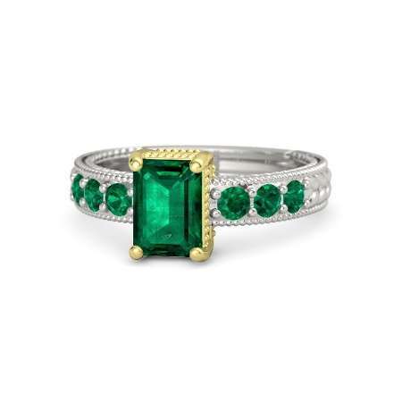 Anello di fidanzamento con smeraldi anche lungo la fascia Gemvara