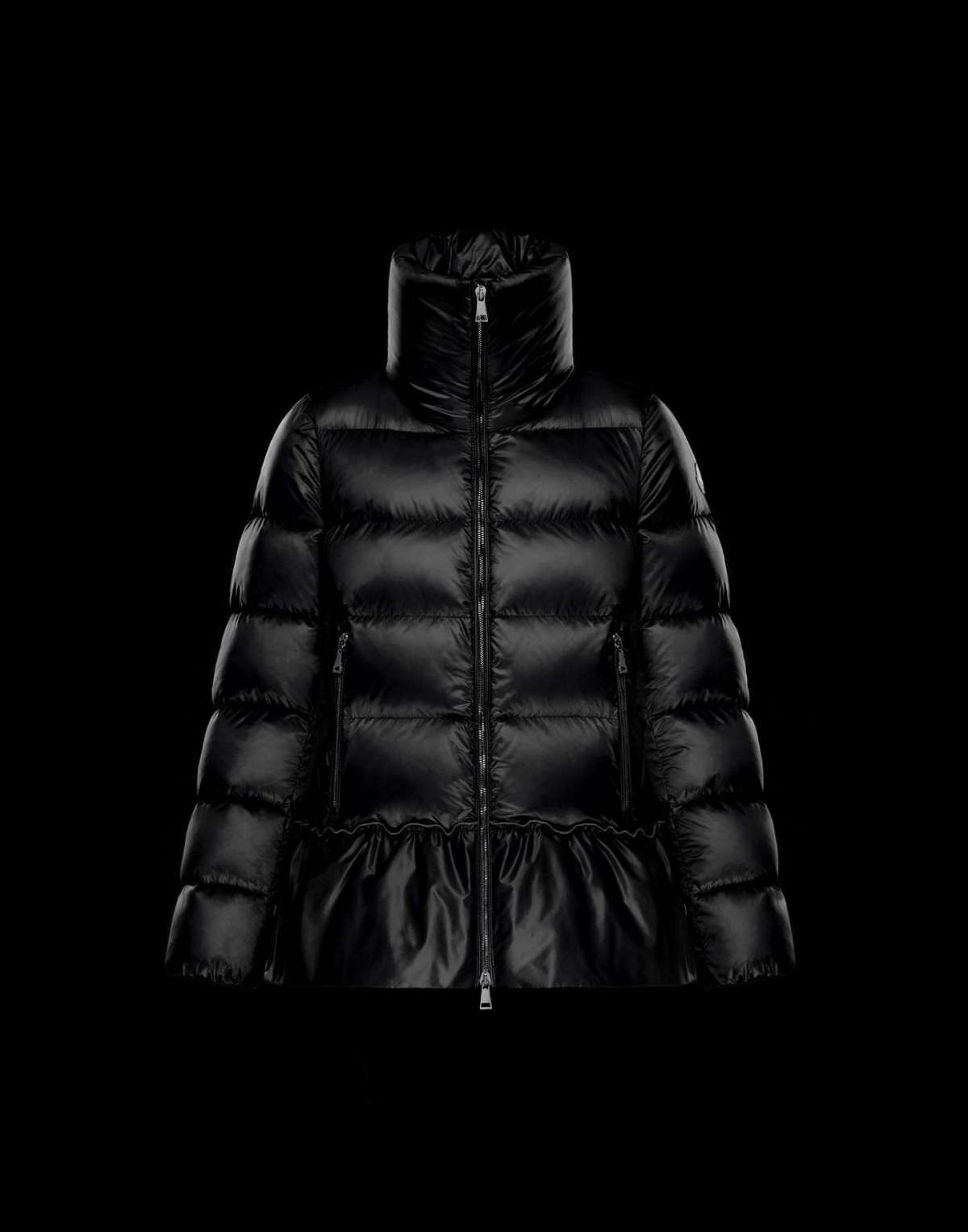 Piumino Moncler con peplum